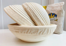 Load image into Gallery viewer, Banneton Bread Proofing Basket Long with linen cloth covered. Banneton Bread Proofing Baskets are Made by Nature, Crafted by Hand. Designed in Canada and made in Vietnam. Shop our range of Rattan/Bamboo/Coconut Products and explore our collection of sustainable environmentally friendly eco-products.
